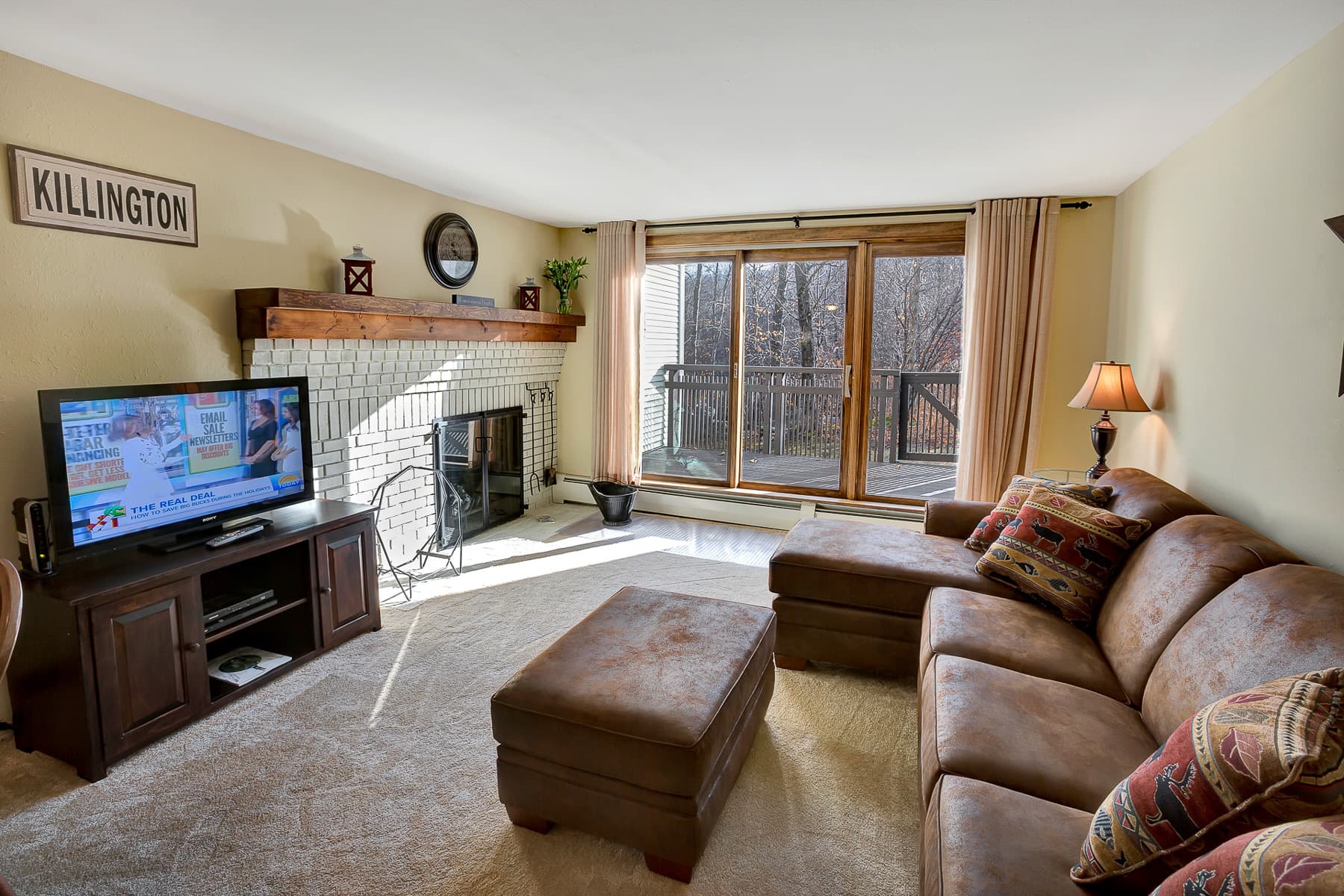 Open the sliding doors in the living room to your own private deck