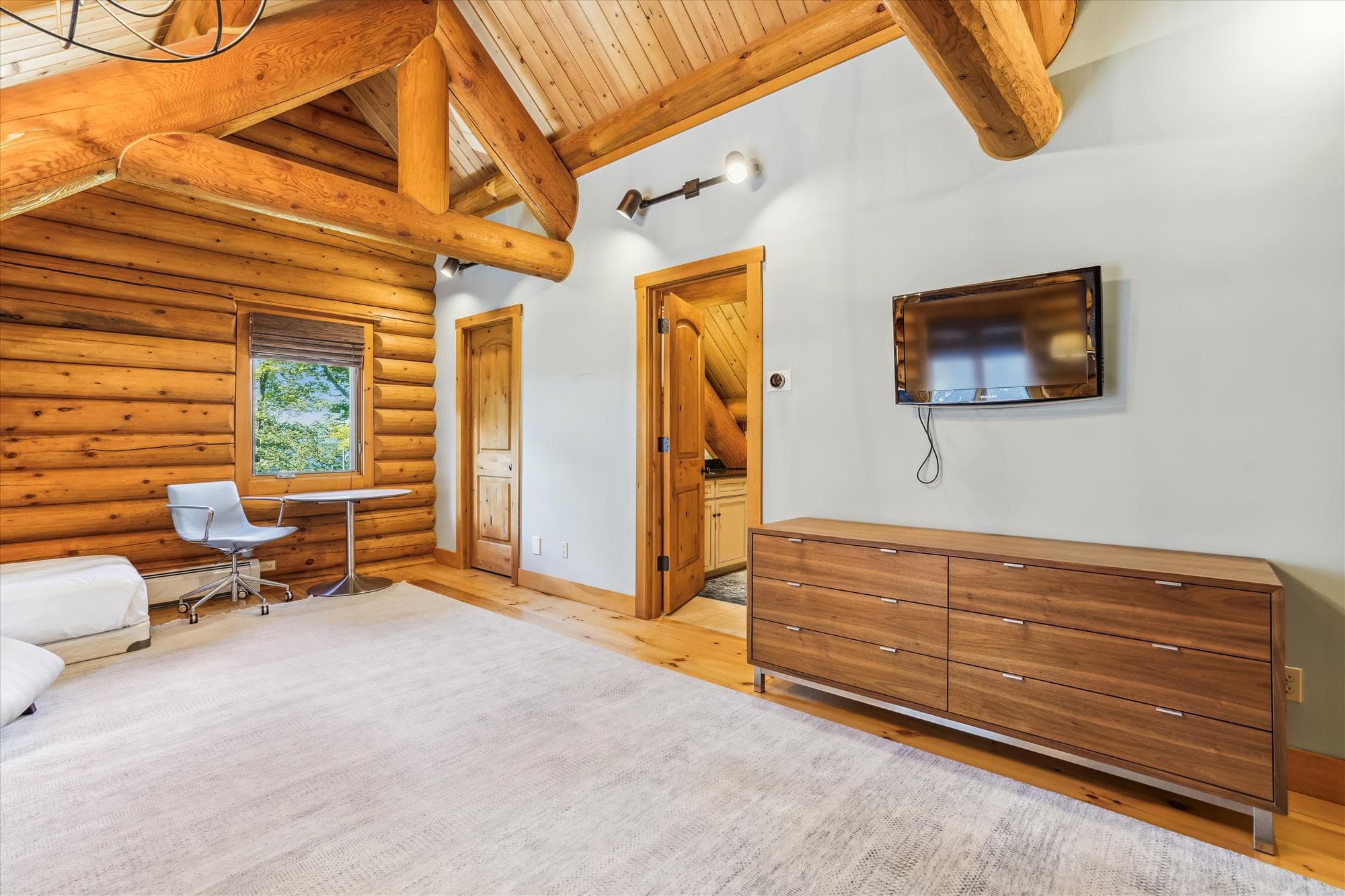 Enjoy the tv in this bedroom.
