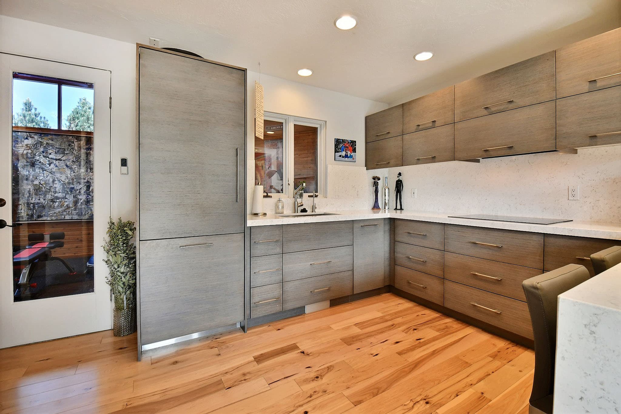 Fridge, Sink, Countertops, Chairs inside Main Street Retreat