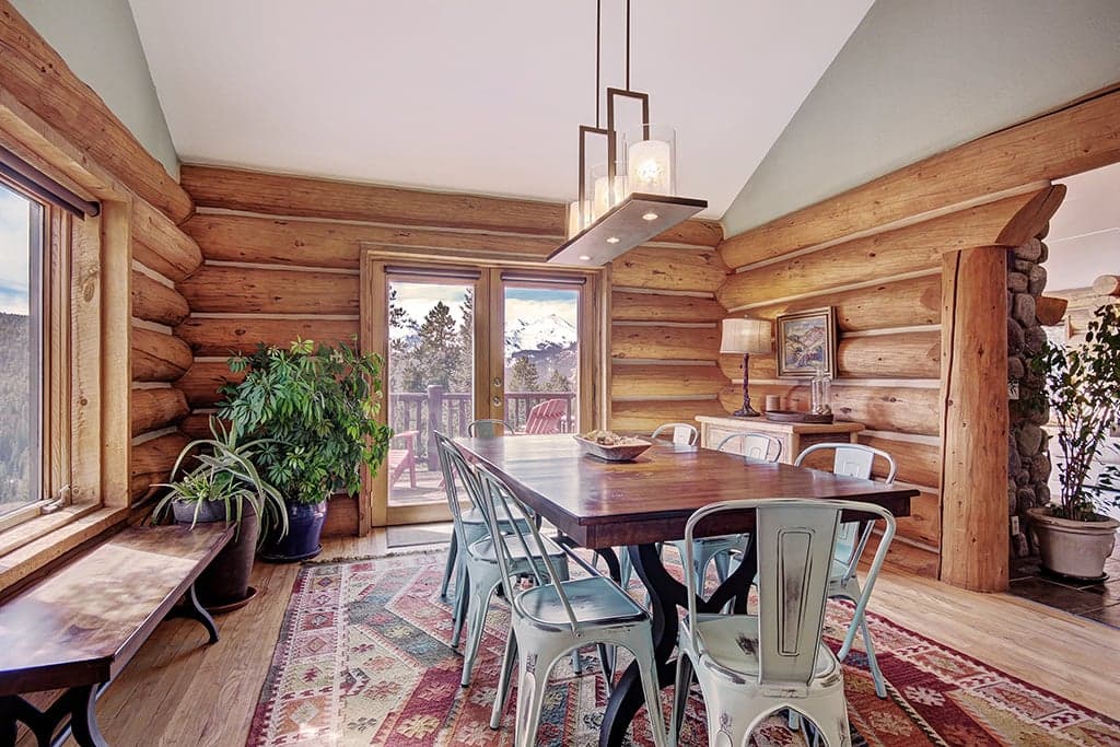 View from kitchen into dining area and deck access - 10 Southface - Breckenridge Vacation Rental