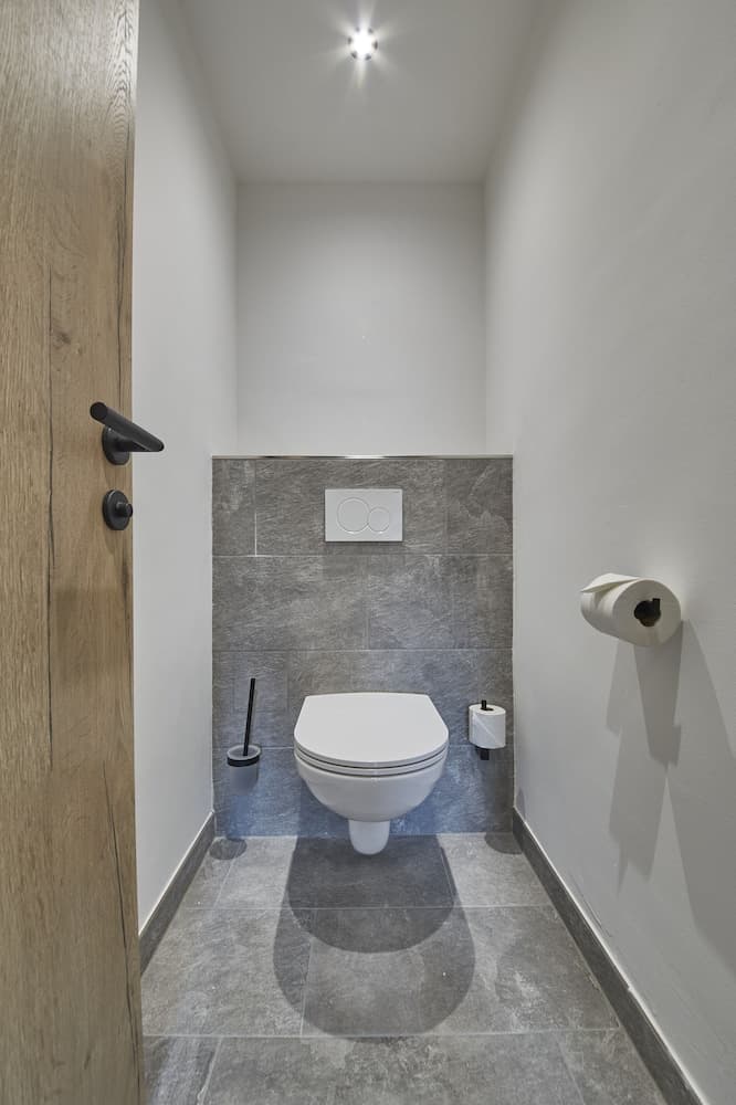 Raised toilet seat