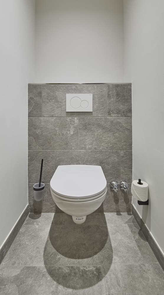 Raised toilet seat